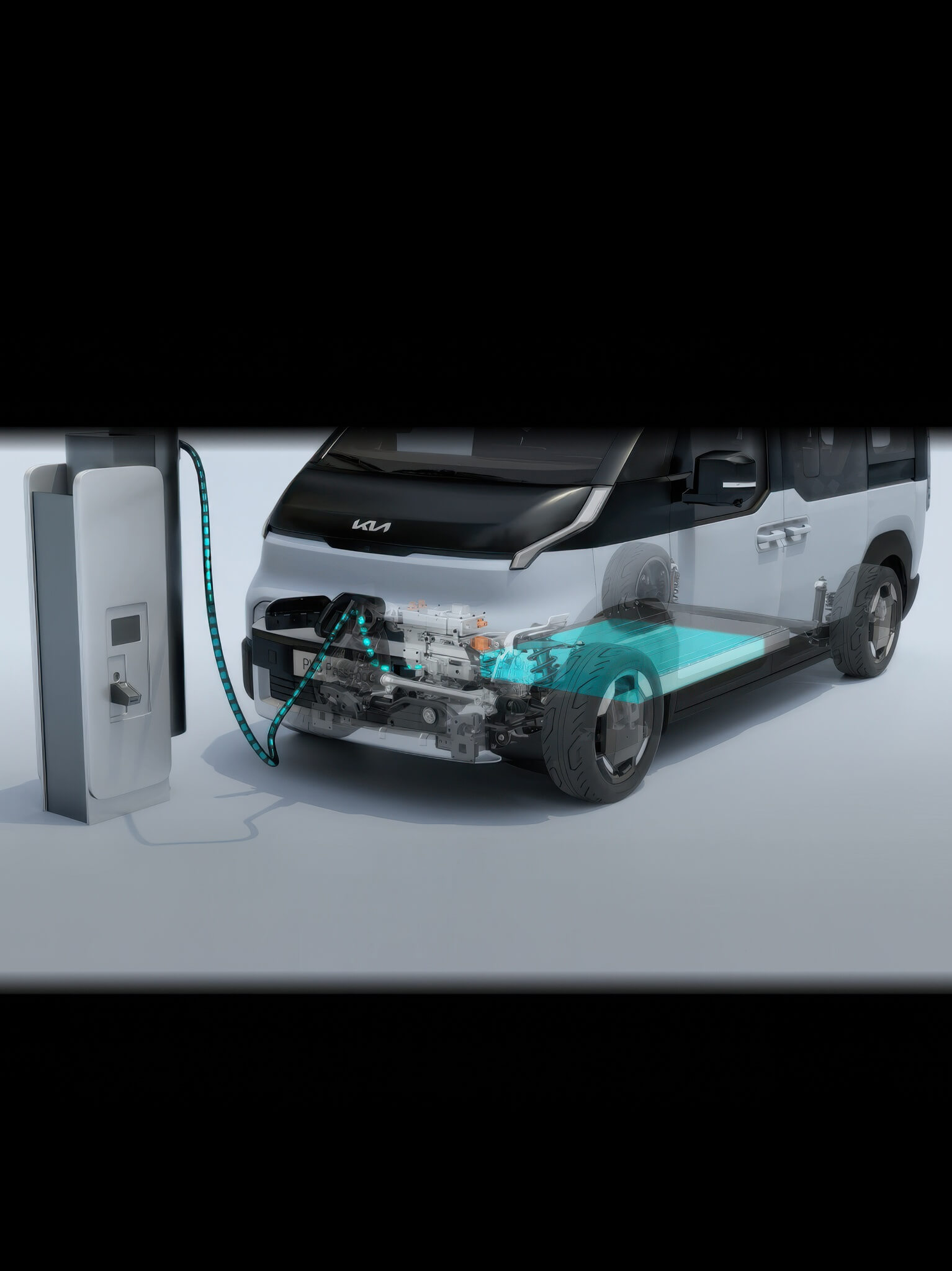 Close-up of the Kia PV5 Passenger front charging port with cable connected