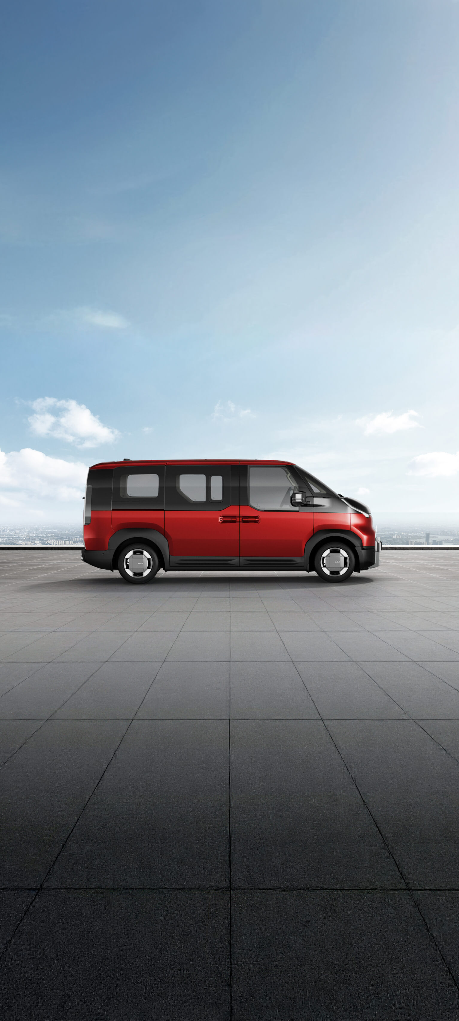 Side view of the Kia PV5 Passenger in runway red shown on exterior color visualizer