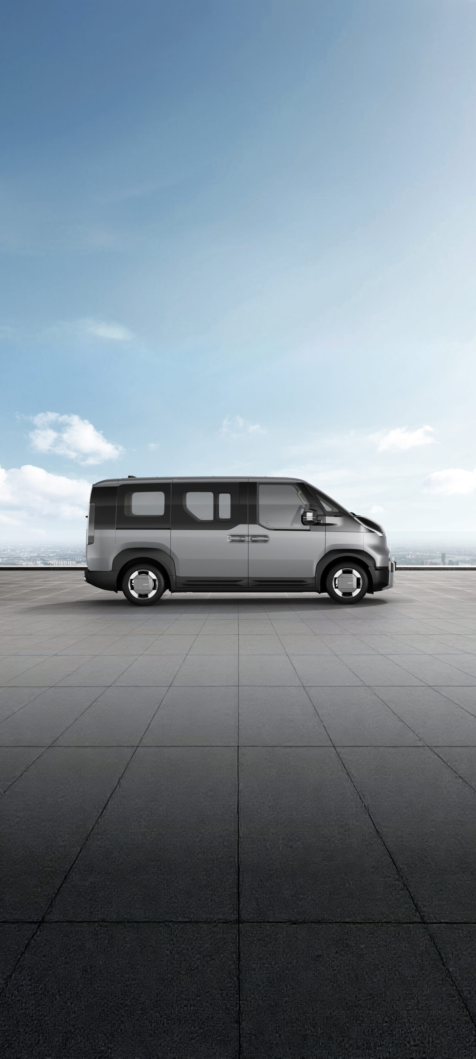 Side view of the Kia PV5 Passenger in steel grey shown on exterior color visualizer