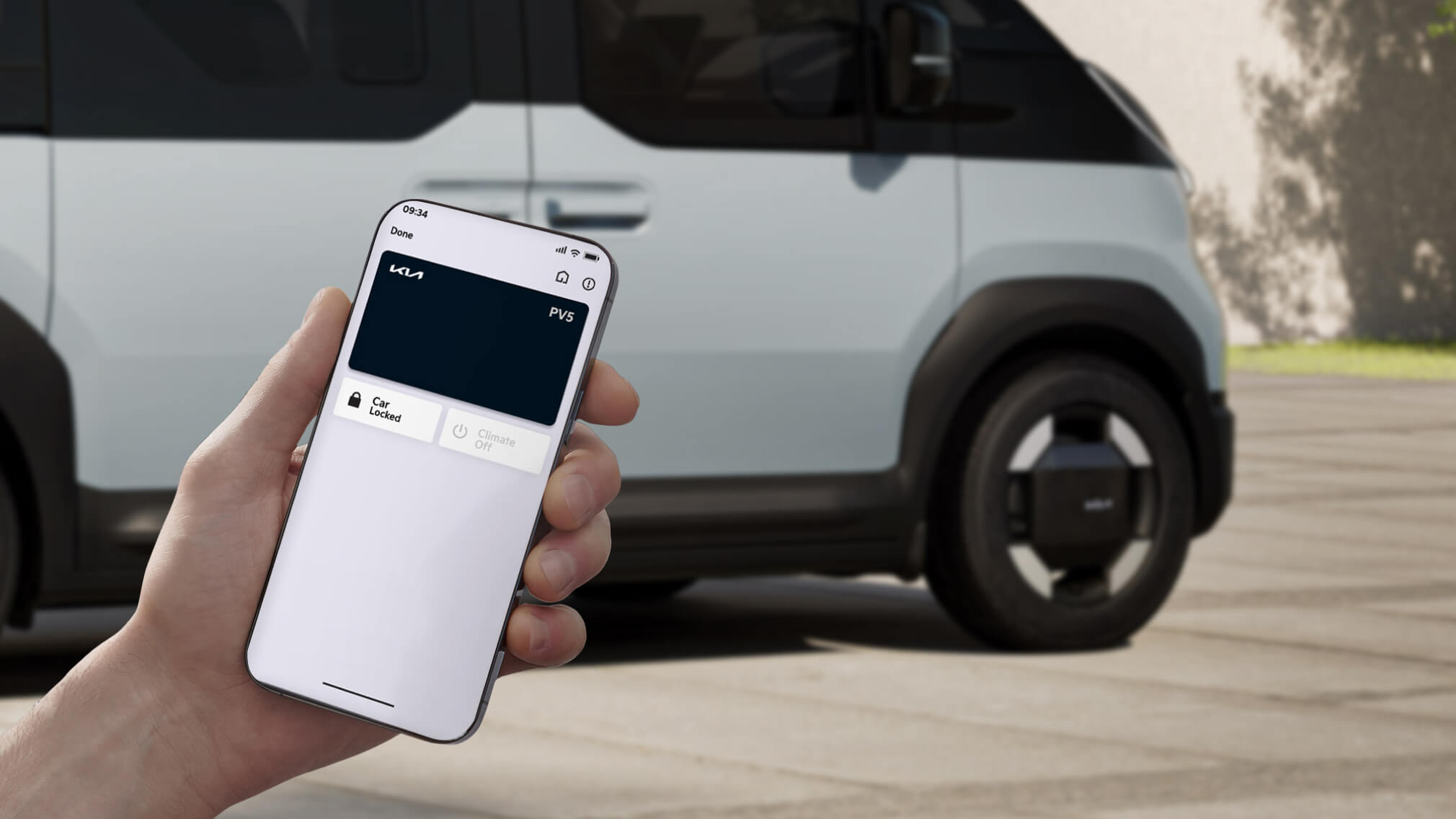 Hand holding smartphone to access Kia digital key feature